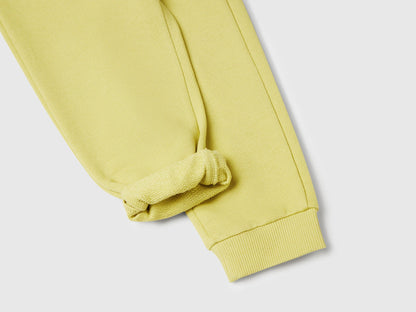 enetton yellow organic cotton trousers side view showing regular fit