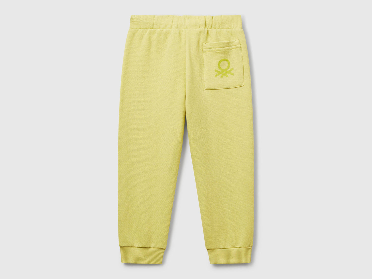 Back view of Benetton logo print trousers with certified organic detail