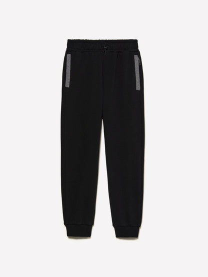 Front view of black clashing jogger sweatpants with a visible side stripe, designed for comfort and athletic style.