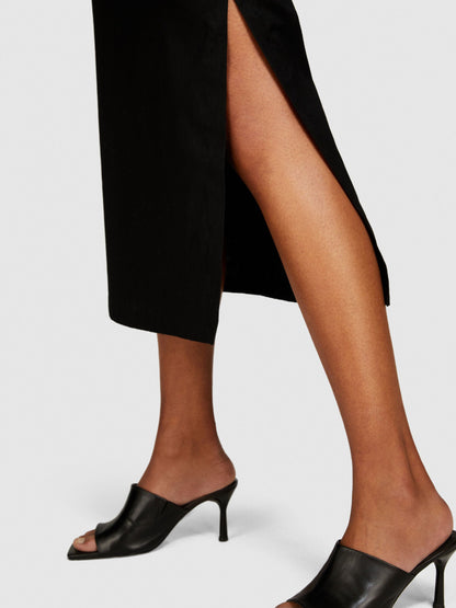 Close-up of black pencil skirt&