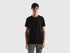 Male model wearing a classic black t-shirt, presented from the front, paired with casual pants.