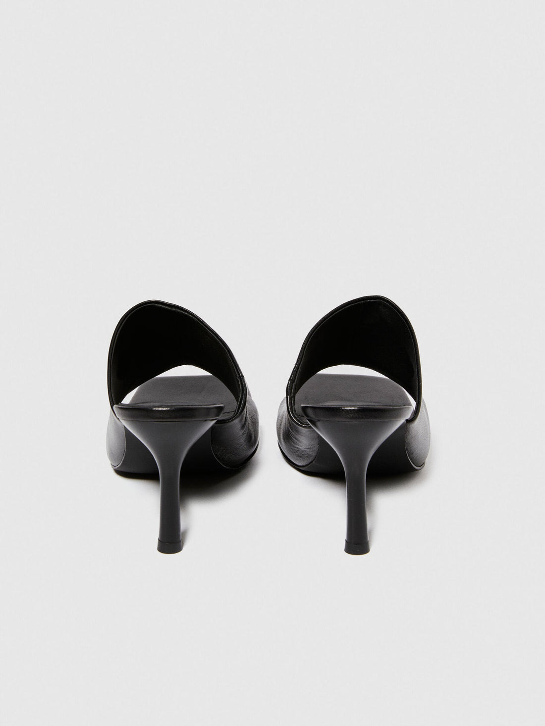 Top-down view of a pair of black sandals for women, highlighting the wide straps and sturdy platform soles, ideal for casual wear in Kuwait.