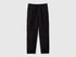 Front view of black parachute trousers with a drawstring waist and knee detailing, a comfortable and stylish choice for active wear in Kuwait.