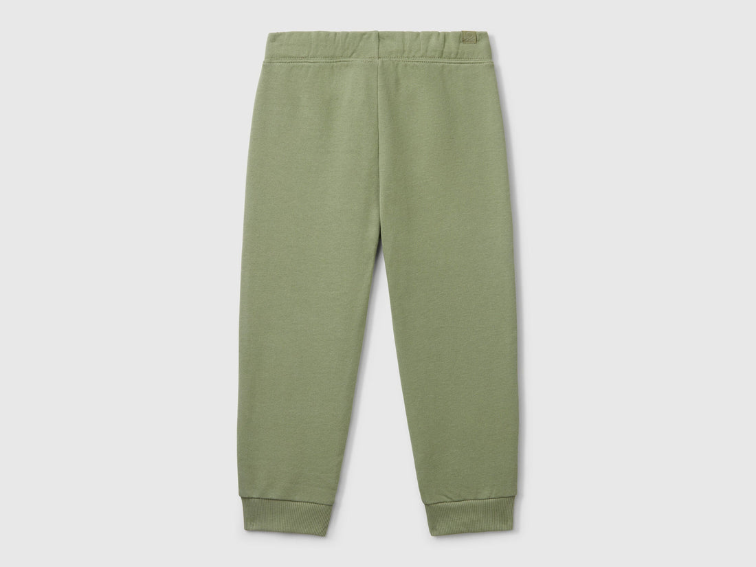 Back flat lay of green boys&