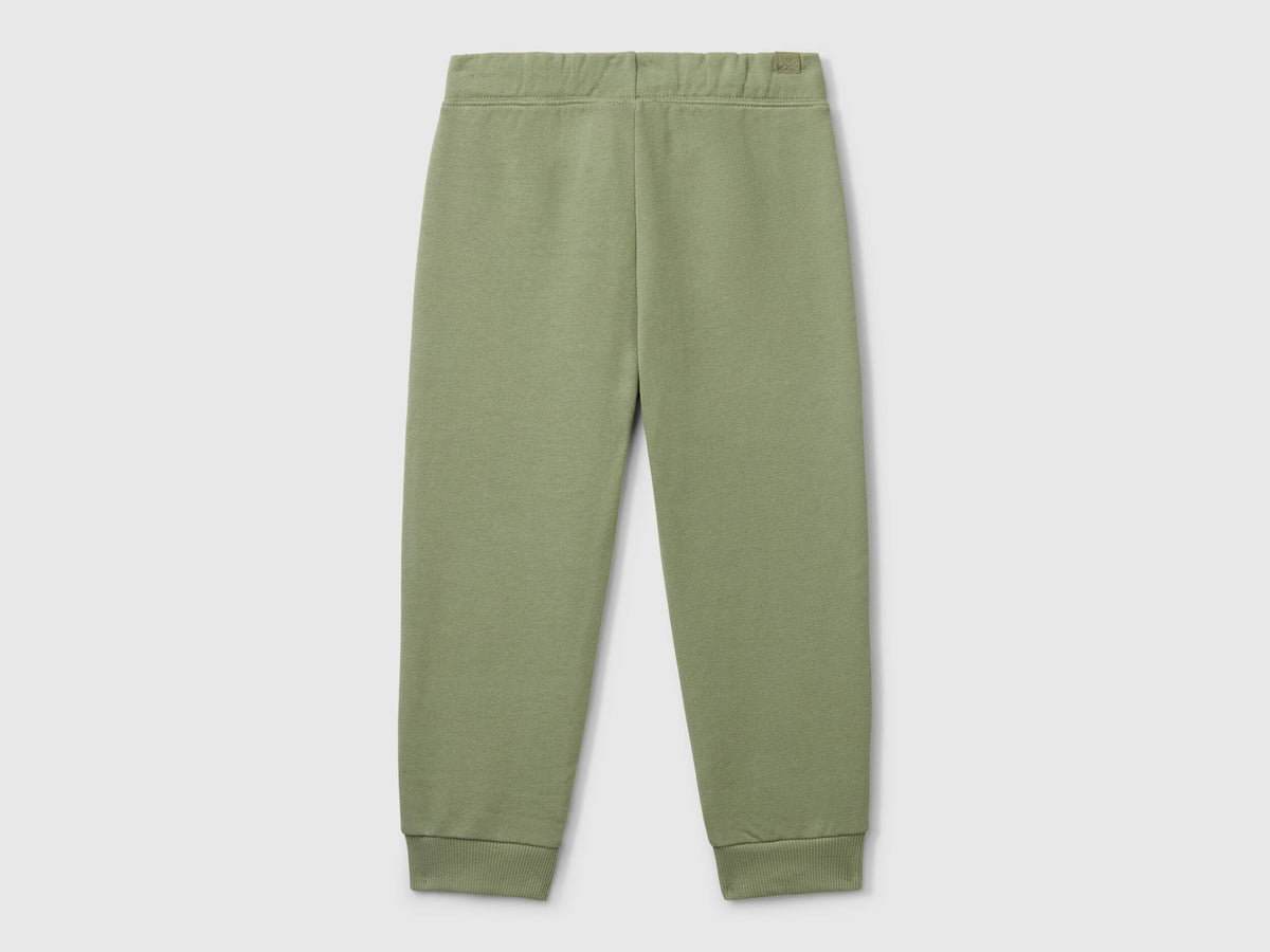 Back flat lay of green boys&