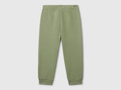 Back flat lay of green boys&