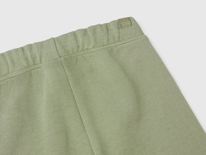 Close-up of the waistband and drawstring of the green boys&