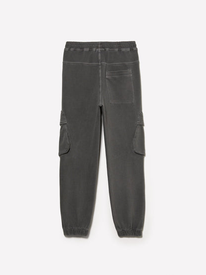 Back view of a pair of dark grey joggers with an elasticated waist and cuffs, offering comfortable casual wear for men or women in Kuwait.