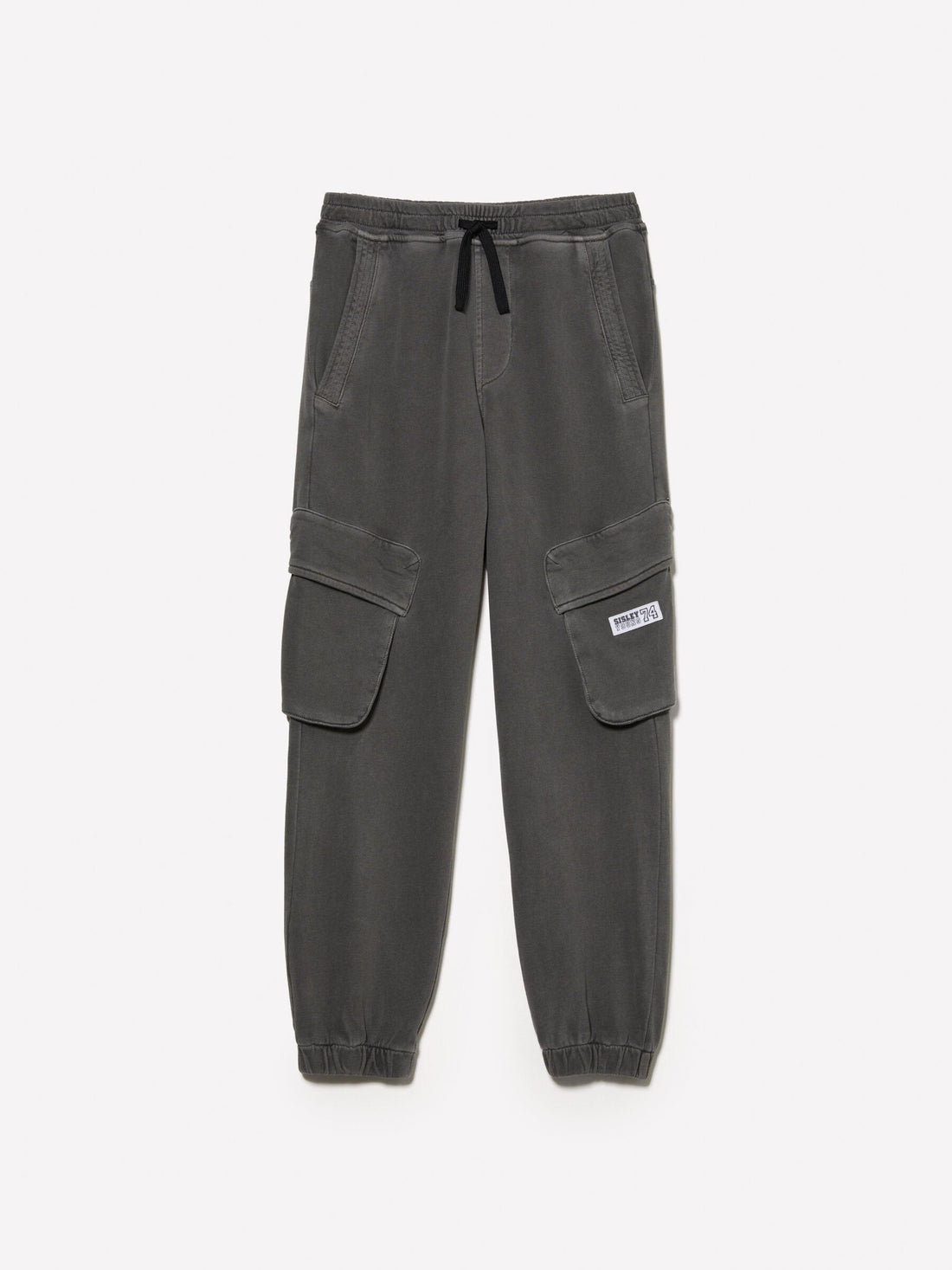 Front view of dark grey joggers with functional cargo-style pockets on the sides and an adjustable drawstring waist, a versatile choice for loungewear or active wear in Kuwait.