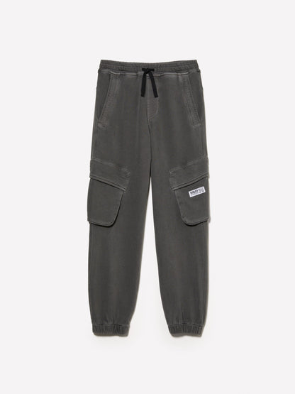 Front view of dark grey joggers with functional cargo-style pockets on the sides and an adjustable drawstring waist, a versatile choice for loungewear or active wear in Kuwait.