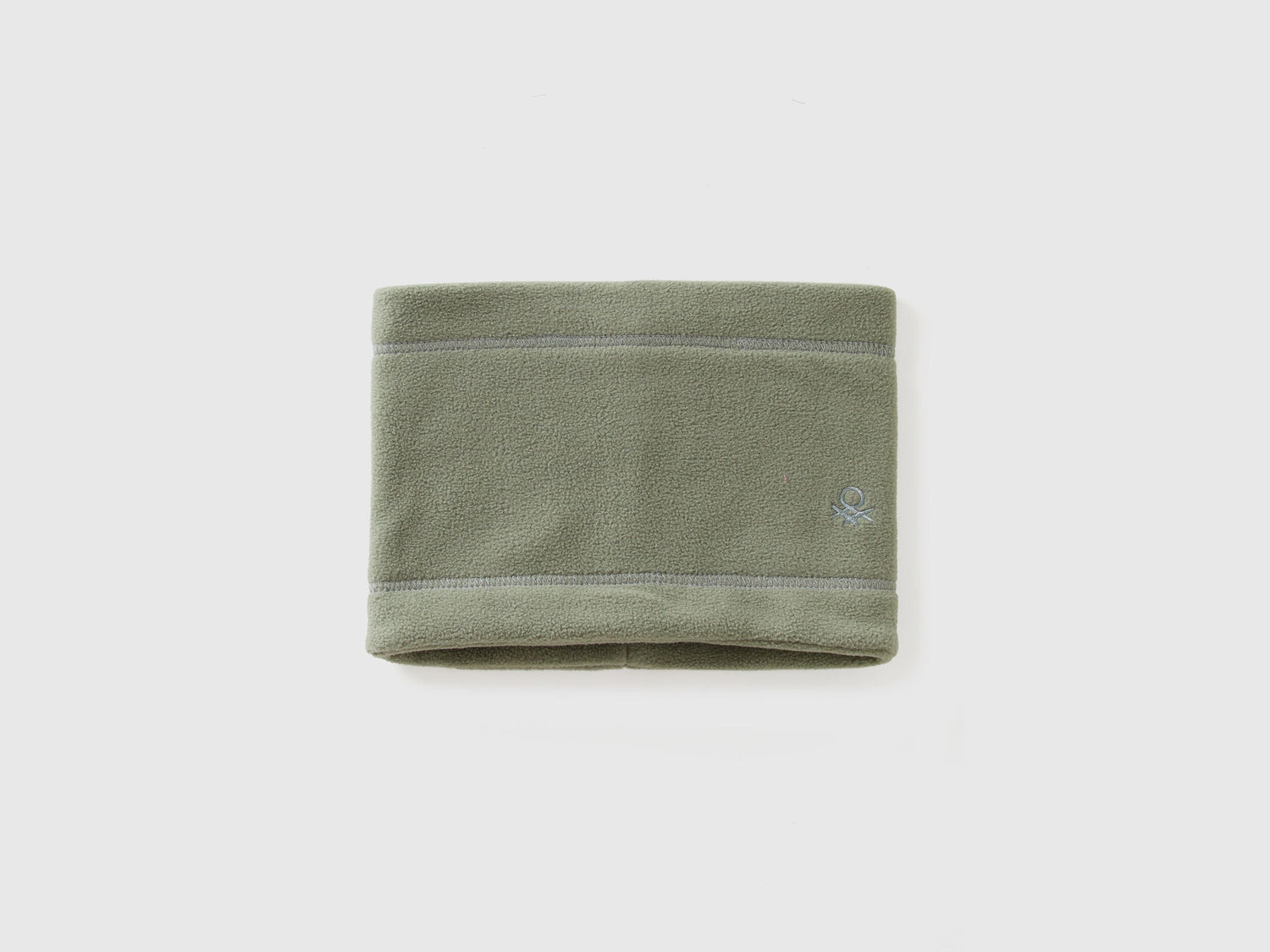 Green fleece neck warmer, folded flat, soft winter accessory.