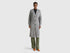 Front view: Woman in grey long cardigan (wool blend), buttoned, with olive wide-leg pants. Ribbed.