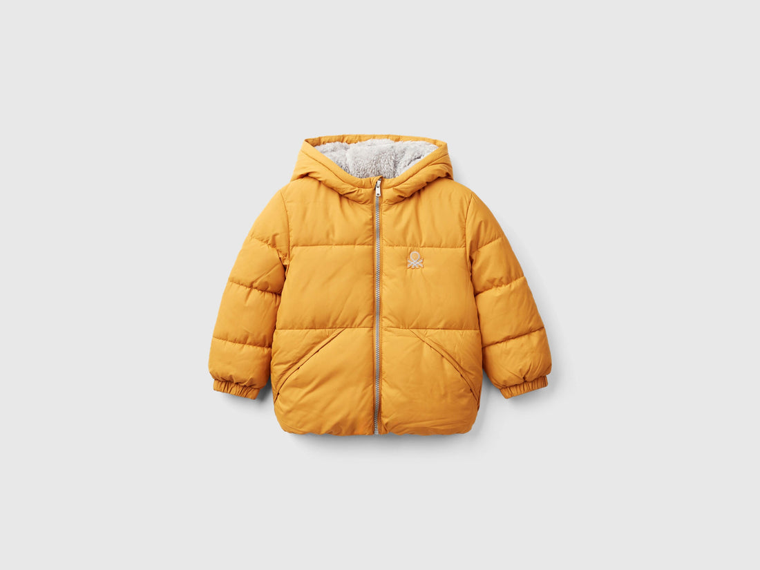 Front view of a mustard yellow Teddy Jacket for kids, featuring a cozy hood and a full zipper, perfect for keeping warm in Kuwait.