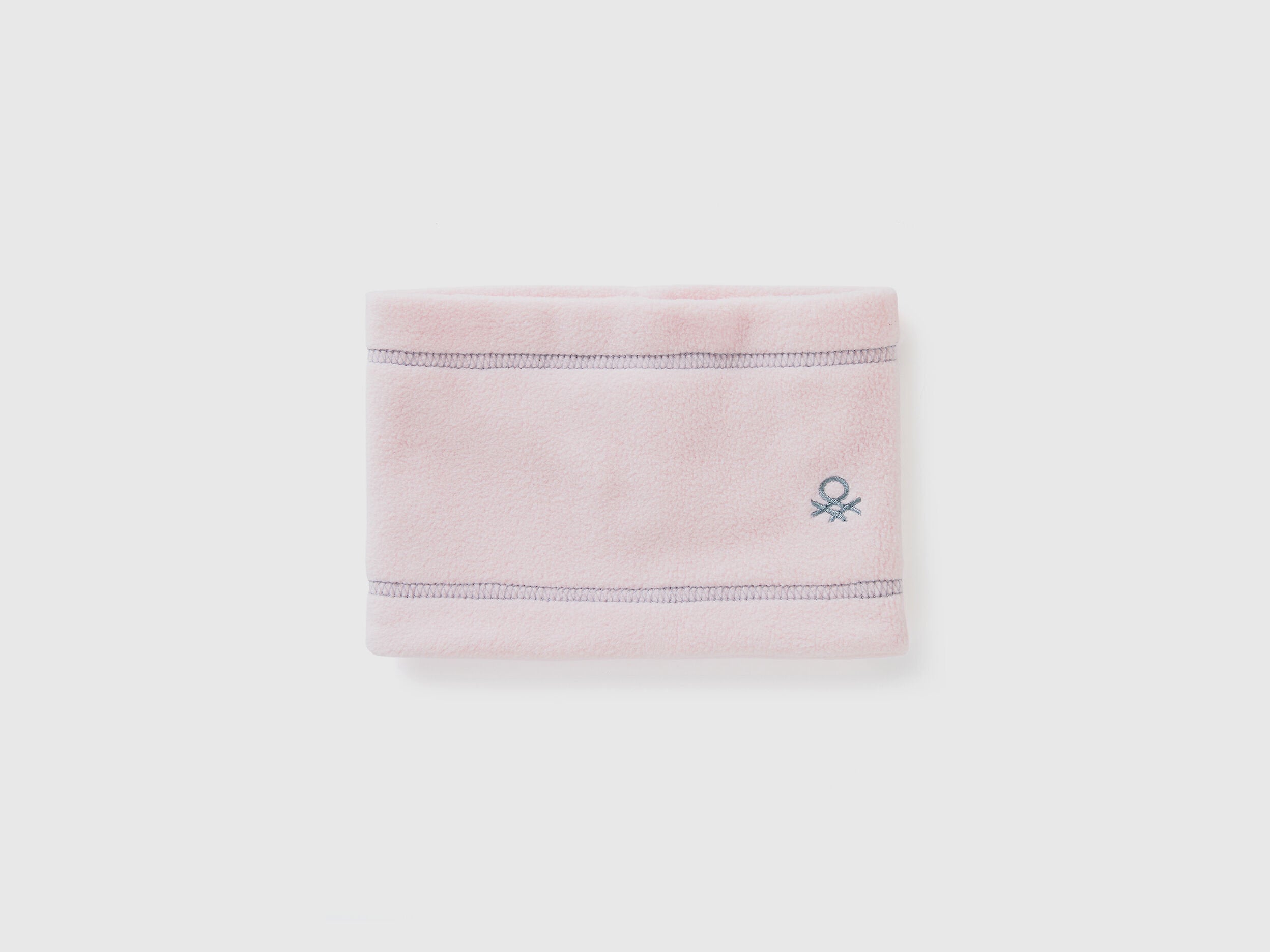 Light pink fleece neck warmer, folded flat with logo.