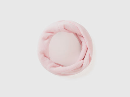 Light pink fleece neck warmer, rolled for soft comfort.