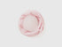 Light pink fleece neck warmer, rolled for soft comfort.