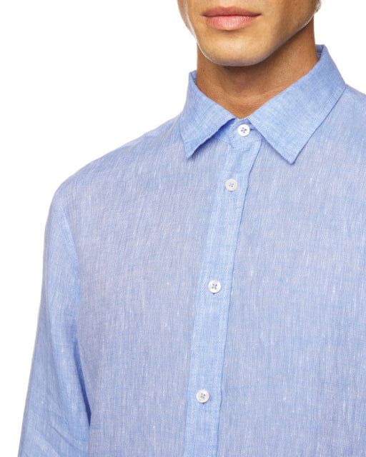 Close-up of the collar and buttons of a light blue long-sleeve linen shirt, highlighting the fabric quality of linen shirts for Kuwait.