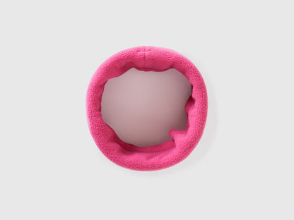 Magenta fleece neck warmer, rolled for warmth and style.