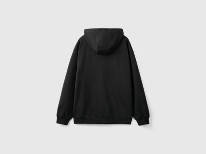 Flat lay front view of a black pullover hoodie for men.