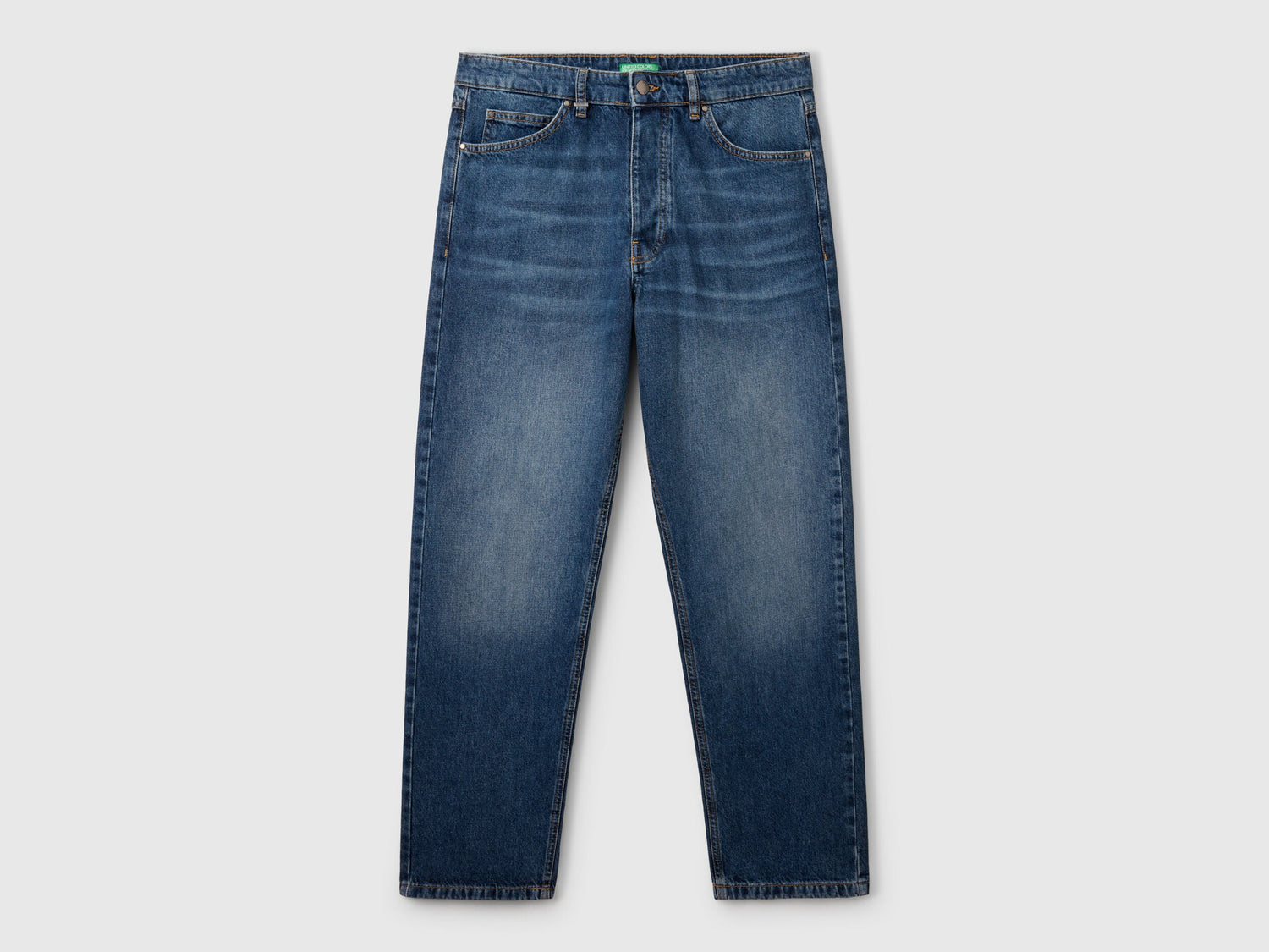 Close-up of the waistband and button fly on a pair of men&