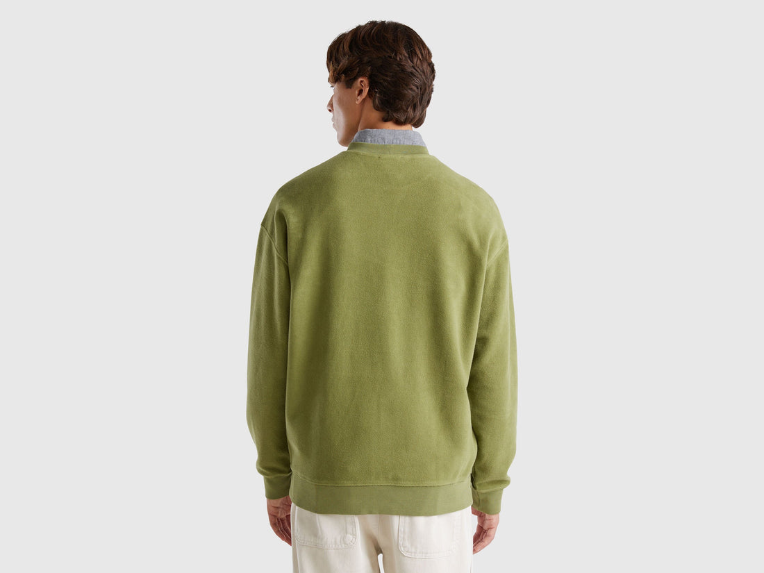 Back view of a dark green cotton sweatshirt for men.