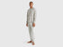Full-length front view of a man wearing white pyjamas with a penguin print in Kuwait.