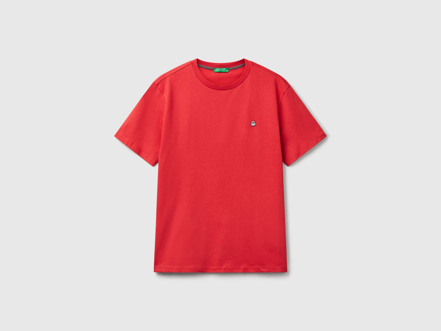 Front flat lay of a plain red short-sleeve T-shirt for men in Kuwait, showcasing its clean design and comfortable fit.