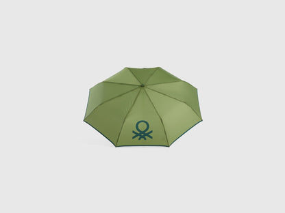 Open military green Benetton umbrella, top view for rain.