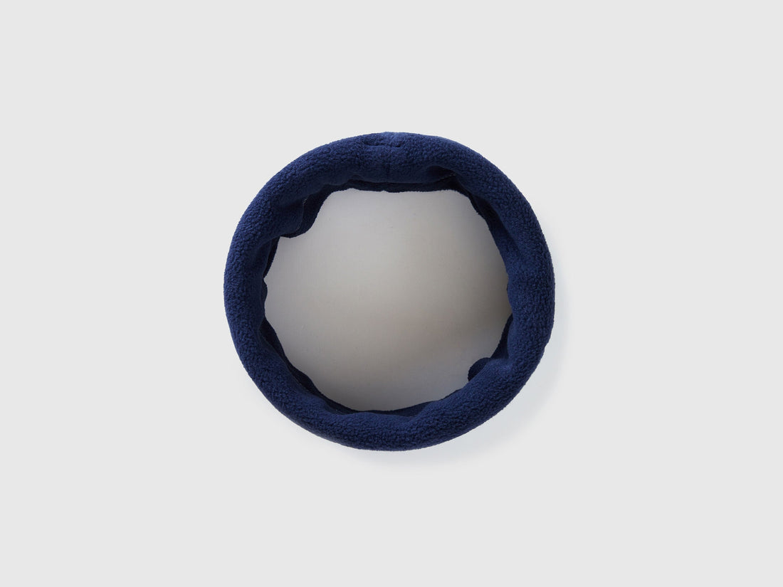 Navy blue fleece neck warmer, circular design for winter comfort.