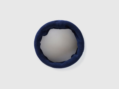 Navy blue fleece neck warmer, circular design for winter comfort.
