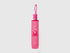 Folded pink Benetton umbrella, compact for rainy days.