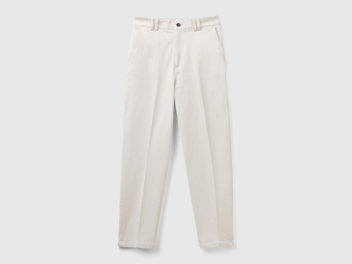 Close-up detail of the waistband and button of women&