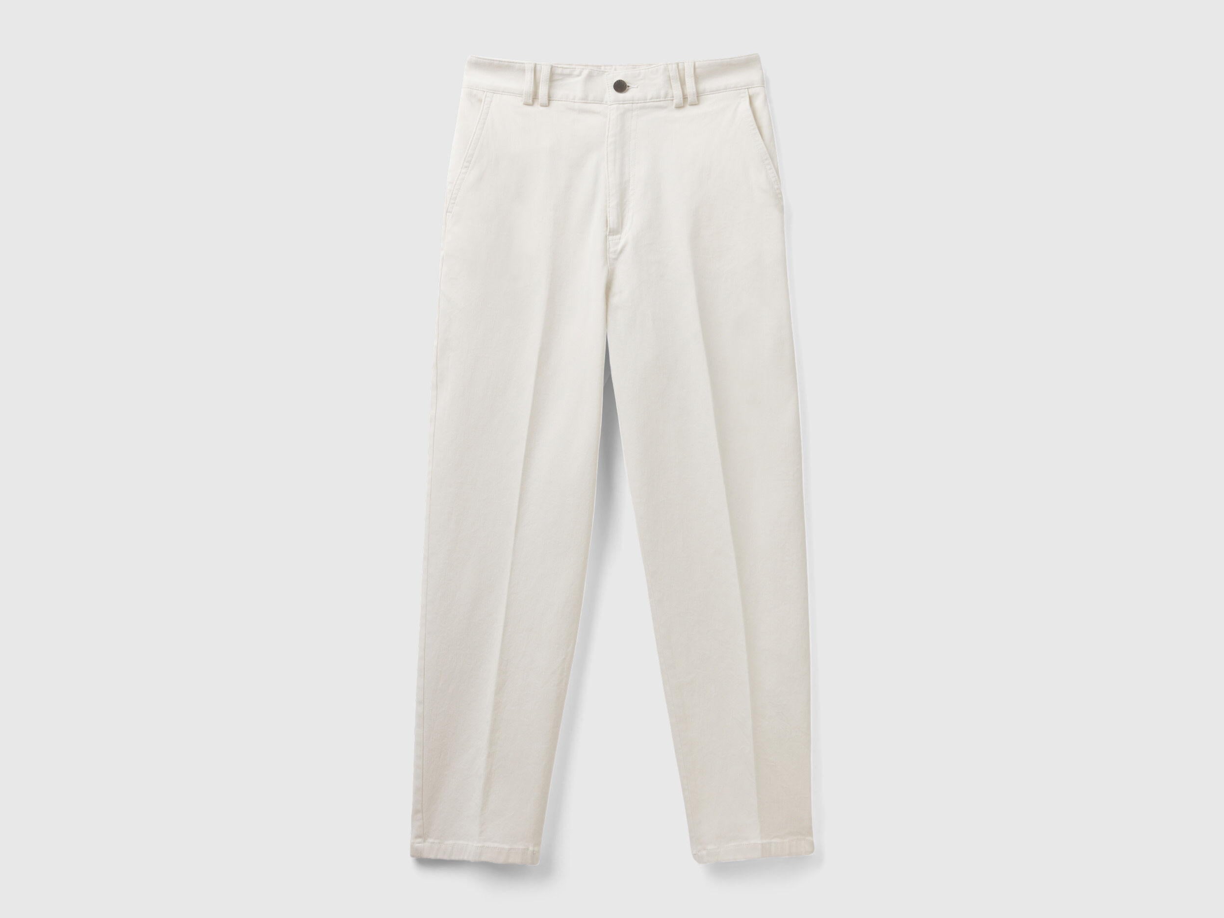 Close-up detail of the waistband and button of women&