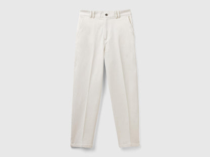 Close-up detail of the waistband and button of women&