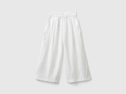 Front view of a pair of flowing palazzo pants, a comfortable and elegant choice for women.