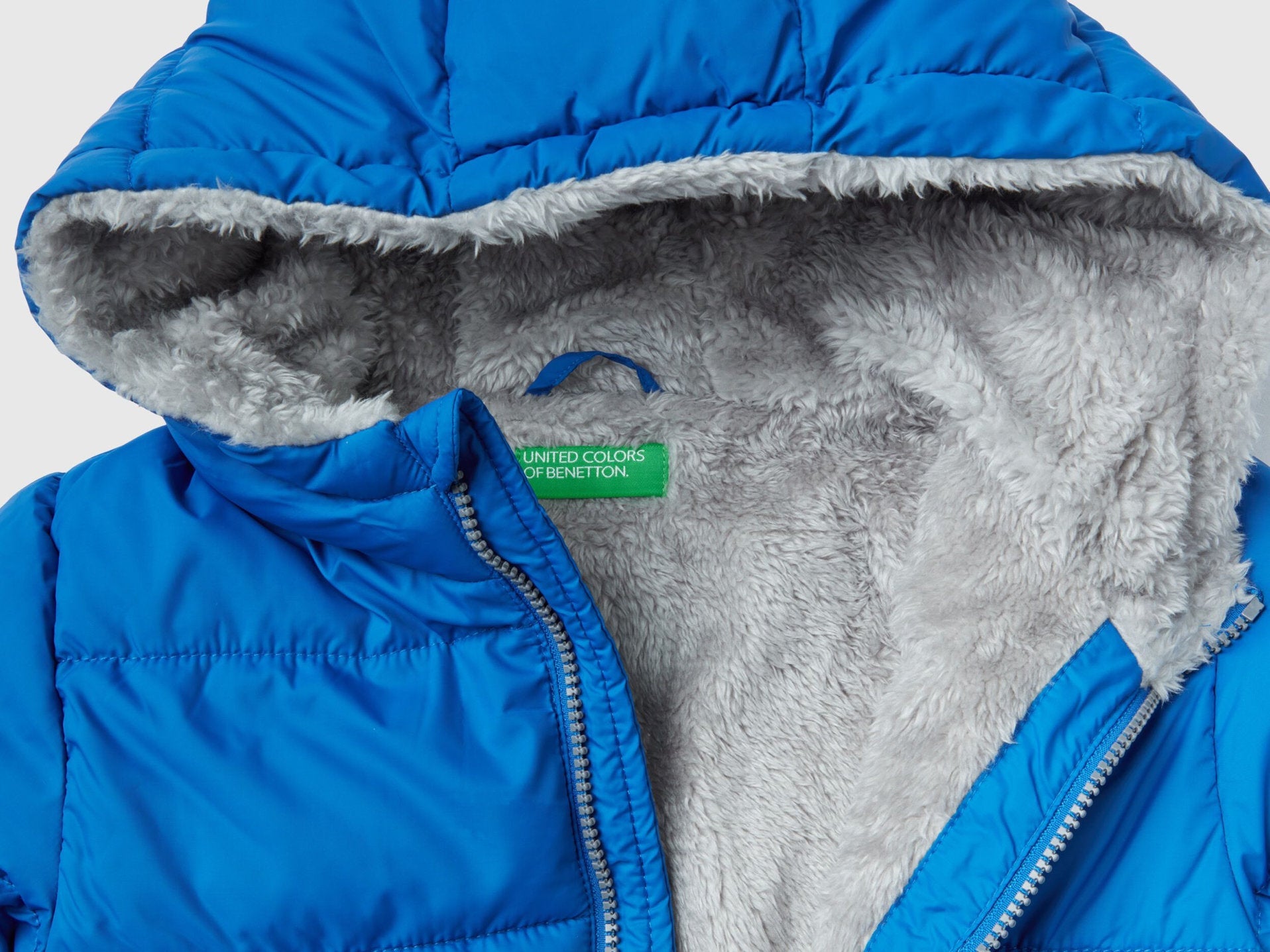 Close-up detail of the plush, soft fabric of a boys&