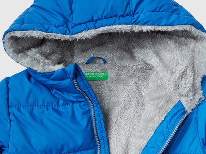 Close-up detail of the plush, soft fabric of a boys&
