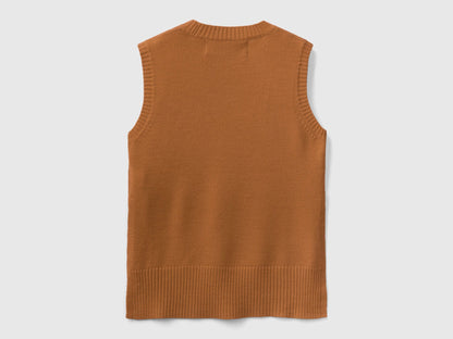 Back flat lay of a light brown knit vest with a ribbed hem.