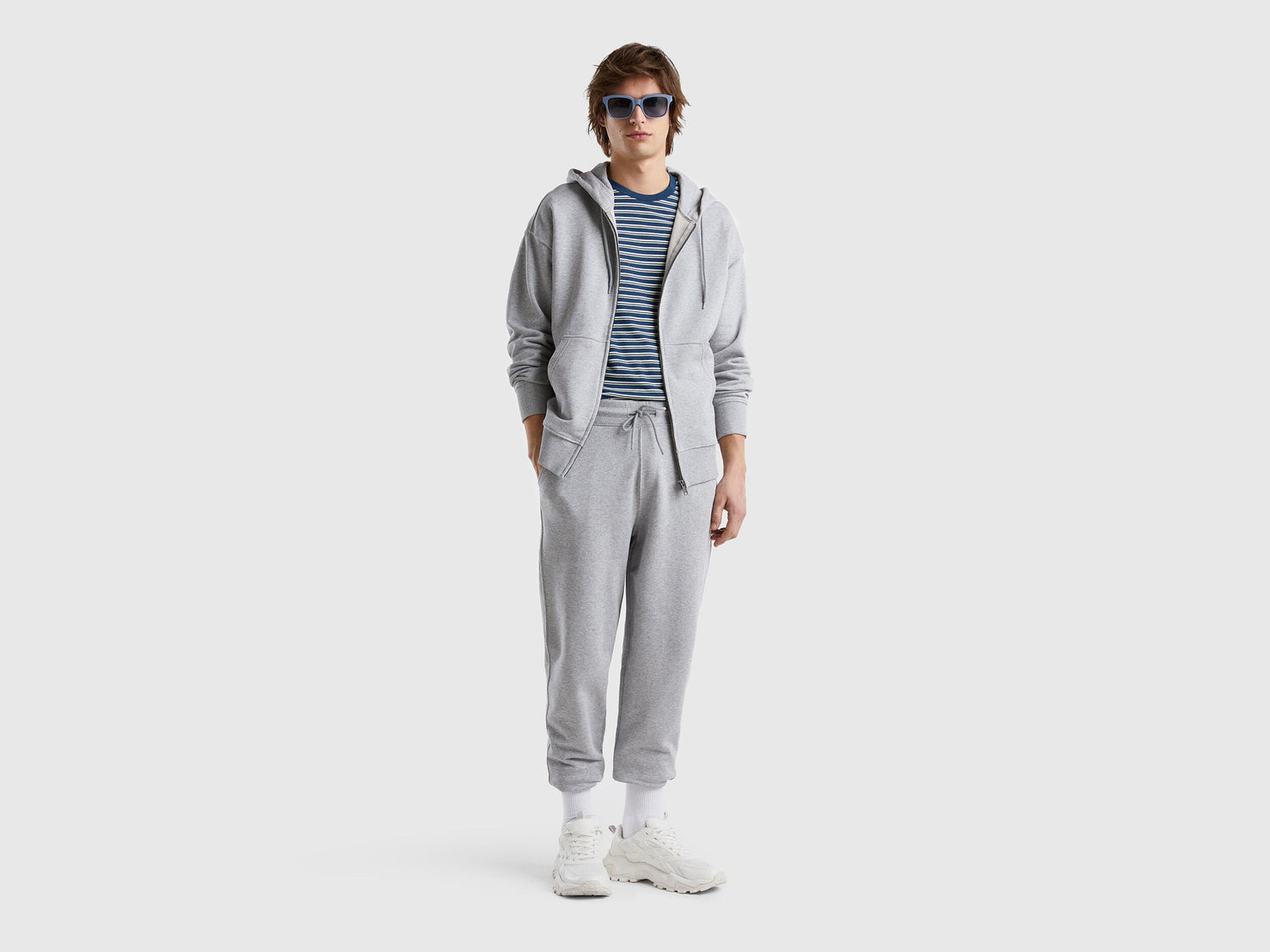 Flat lay front view of a grey cotton zip-up hoodie for men.