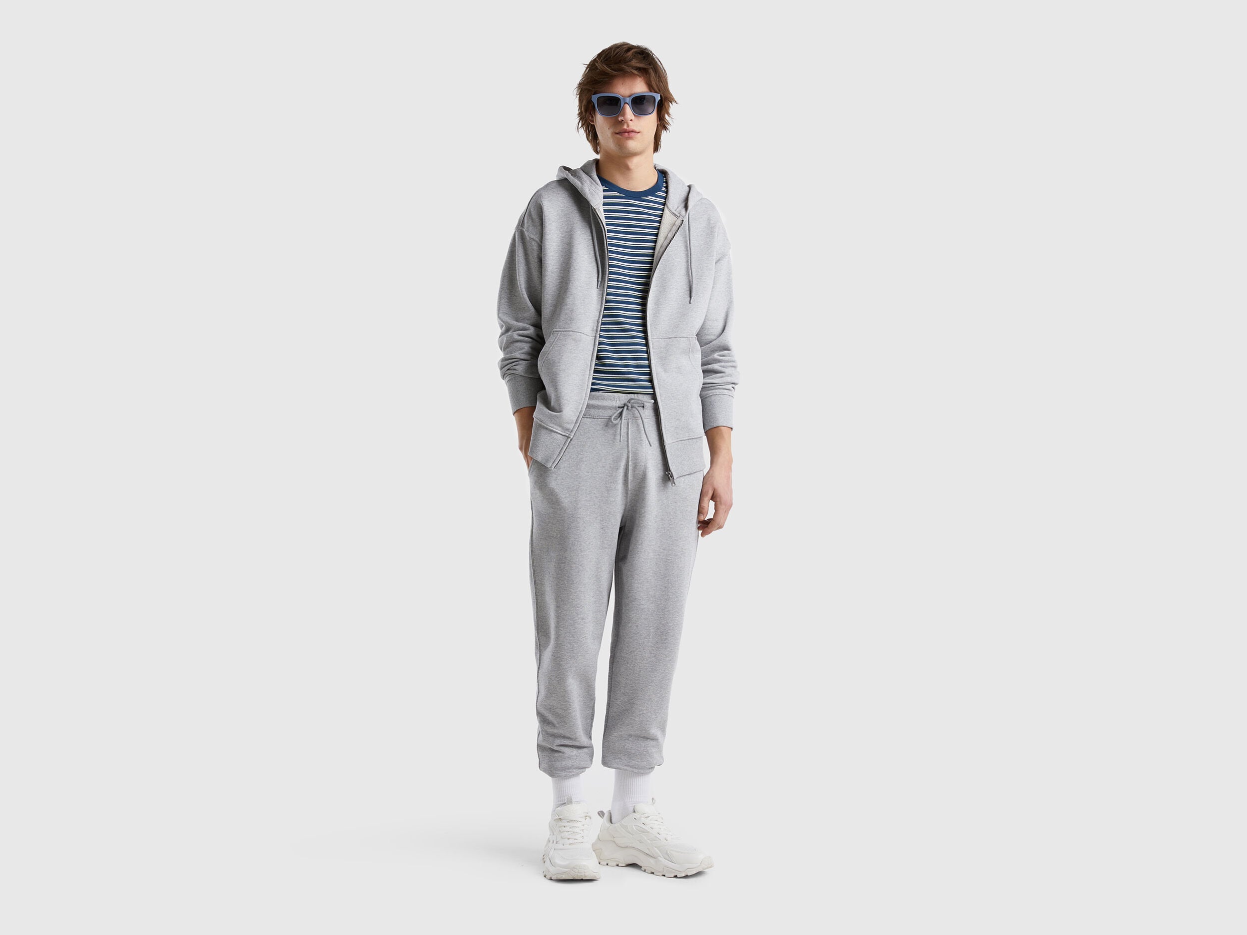 Flat lay front view of a grey cotton zip-up hoodie for men.