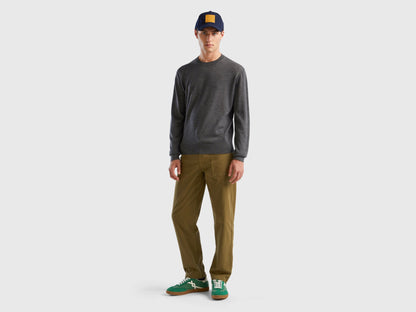 Flat lay front view of a grey merino wool sweater for men.