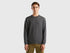 Front view of a man wearing a grey merino wool sweater.