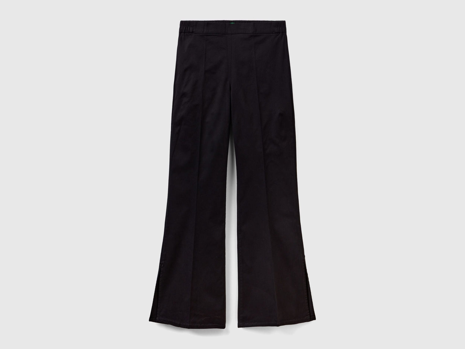 Flat lay front view of black flared pants for women.